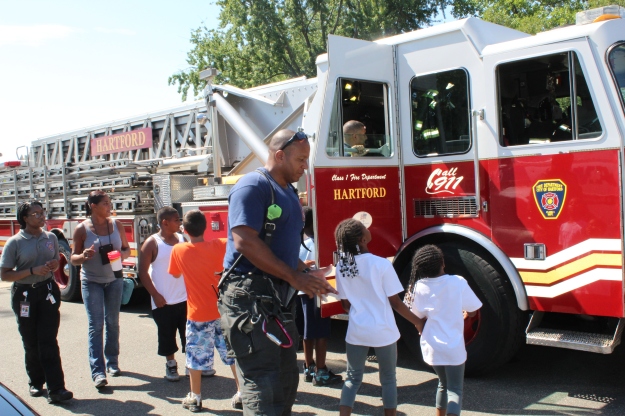 Kids got a close-up and personal look at the city's fire and safety equipment while also talking with firefighters and EMTs. Photo credit: USFWS