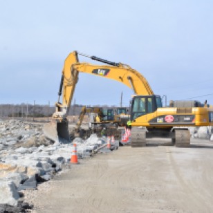 Following Hurricane Sandy, the Service and its partners strengthened the access road by adding armor stone along the ocean side. Credit: USFWS